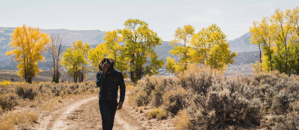 Man walking along a trail in Vail, Colorado.