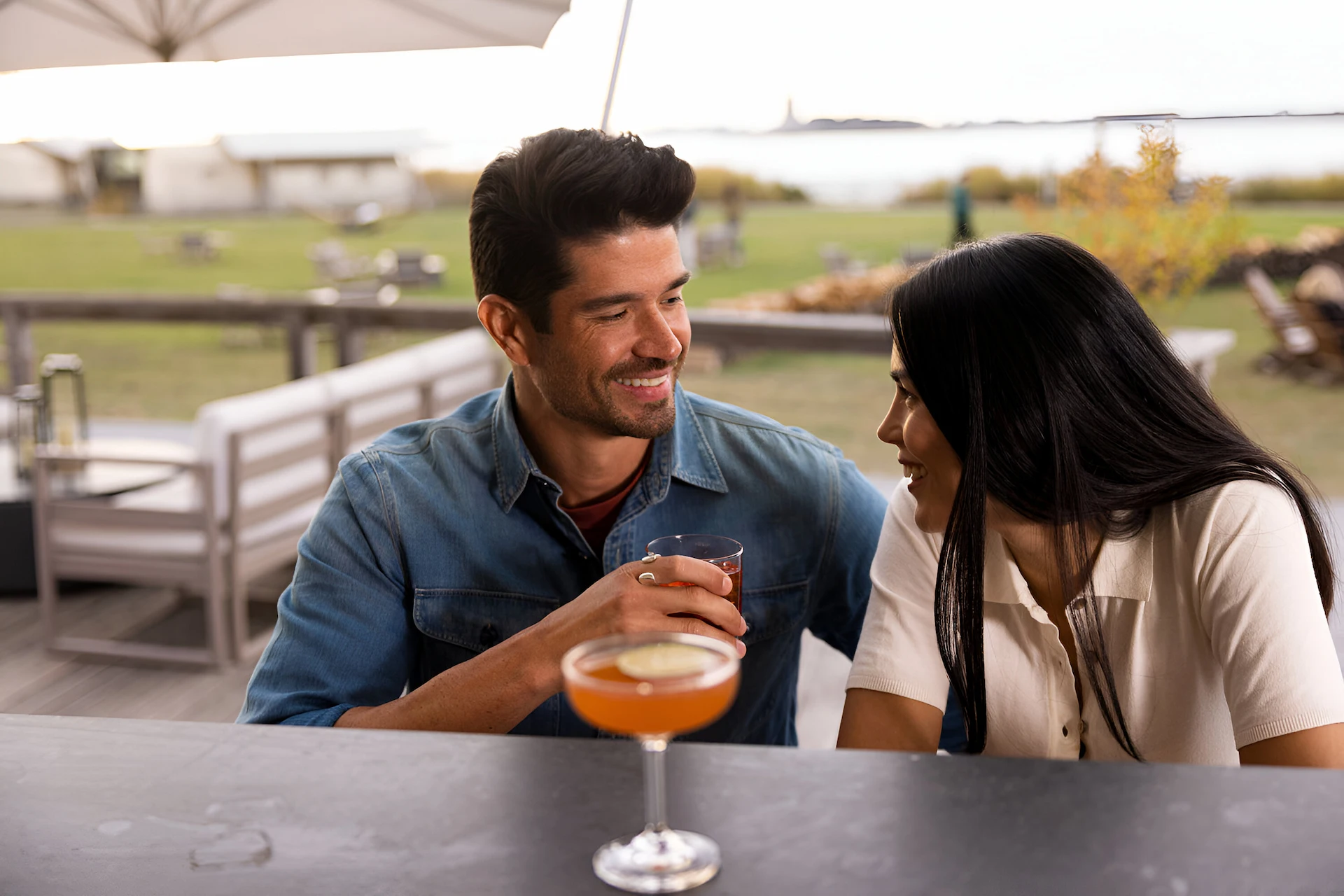 Couple enjoying cocktails in Collective Retreats