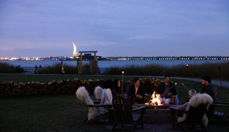 campfire with statue of liberty